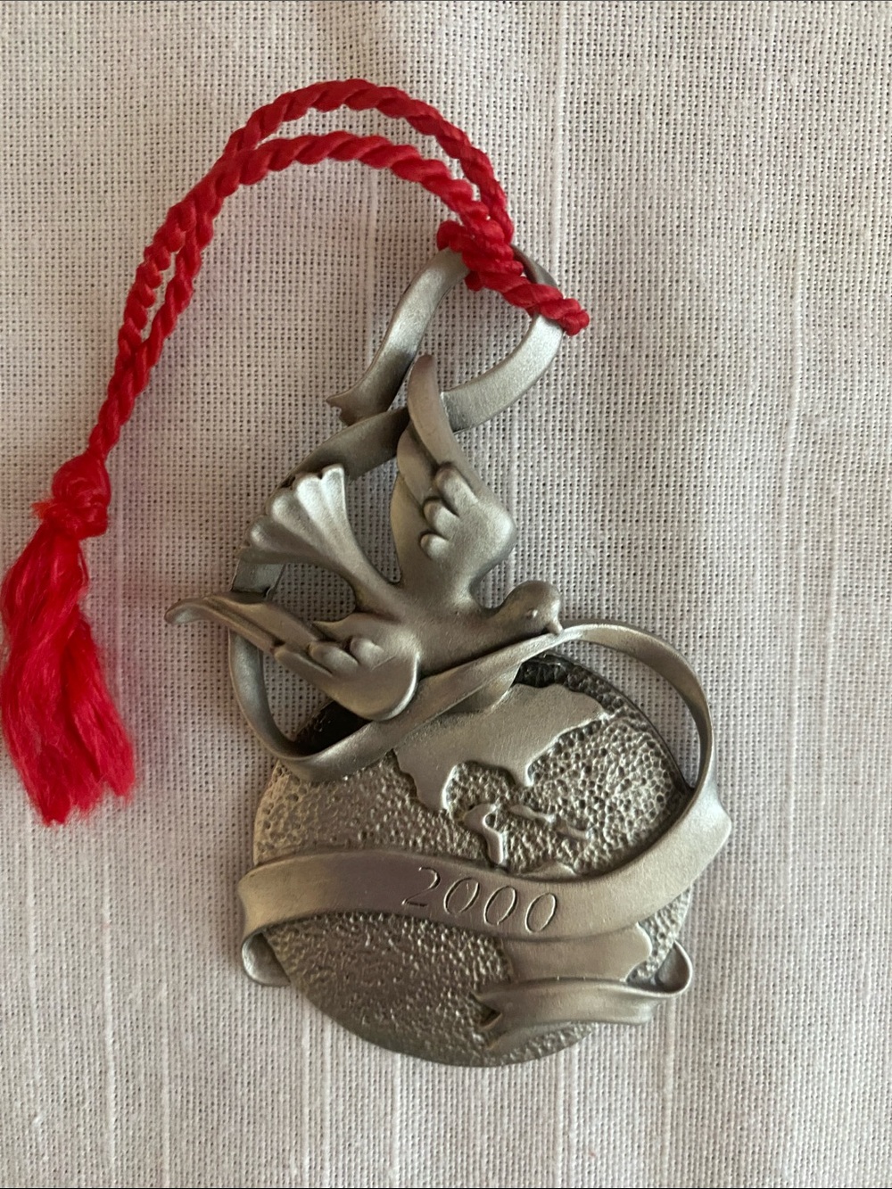 Vintage AVON 2000 Pewter “Peaceful Millennium” Christmas Ornament.